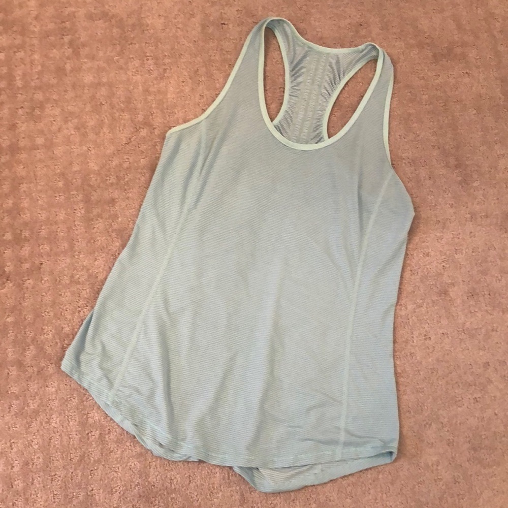 Lululemon light teal / blue light tank top. T back.  Rouging up the back.